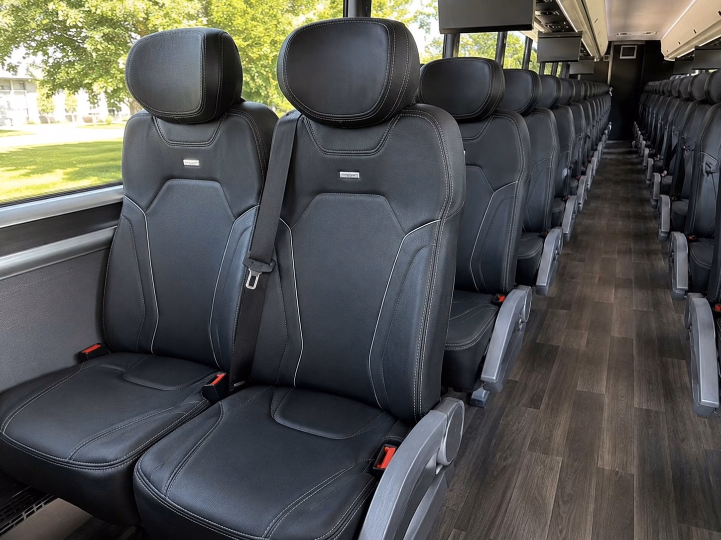 how trip distance and duration affect des moines bus rental rates